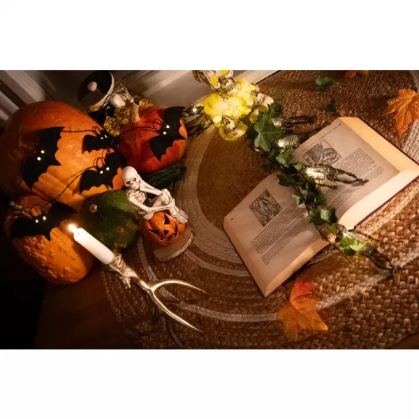 RHW 015 Sedící kostlivec 1 LED MC RETLUX